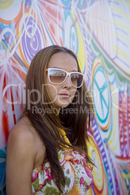 Beauty woman and graffiti wall