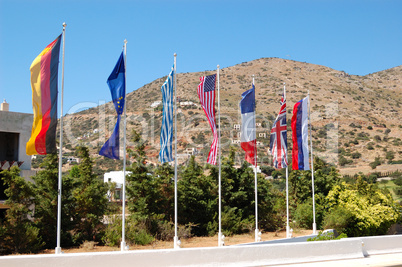 The flags at entrance of luxury hotel, Crete, Greece