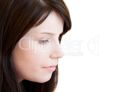 Portrait of a serious teenager against white background