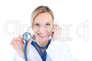 Pretty young female doctor holding a stethoscope