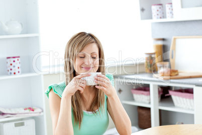 Pretty young woman enjoy her coffee