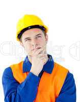 Pensive male worker wearing helmet