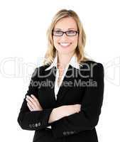 Self-assured businesswoman with folded arms