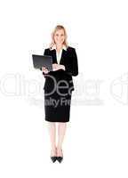 Delighted businesswoman using her laptop standing