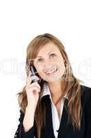 Cheerful blond businesswoman talking on phone