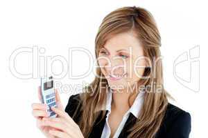 Charming businesswoman holding a calculator