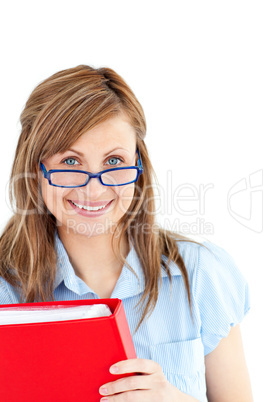 Delighted caucasian businesswoman holding holding a red folder