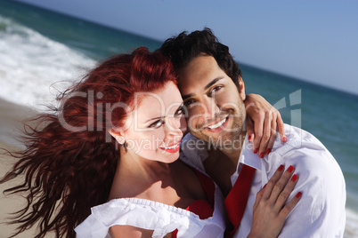 Closeup young couple enjoying on the beach