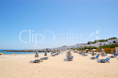 Sunbeds at the beach of luxury hotel, Crete, Greece