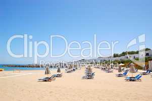 Sunbeds at the beach of luxury hotel, Crete, Greece