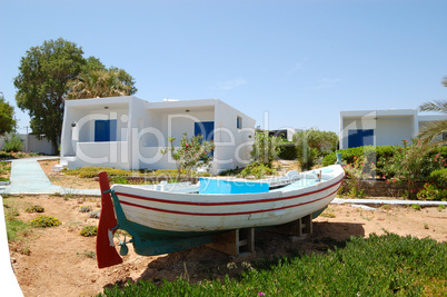 Old boat as decoration of luxury hotel, Crete, Greece