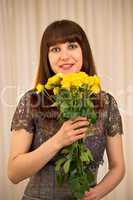 Woman with bunch of roses