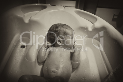 Newborn Baby and his first Bath