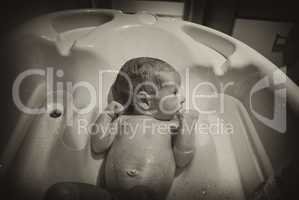 Newborn Baby and his first Bath