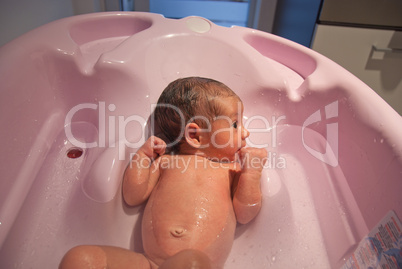 Newborn Baby and his first Bath