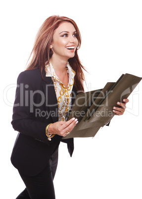 Businesswoman walking with files in her hands