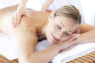 Relaxed caucasian woman receiving a health treatment