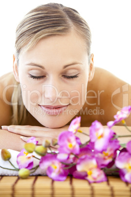 Portrait of a relaxed woman lying on a massage table