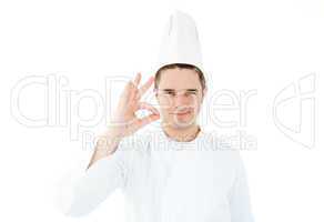 Handsome cook giving hand signal