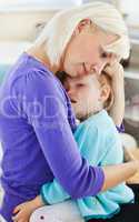 Blond woman taking care of her child
