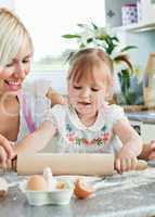 Lucky woman baking cookies with her daughter