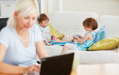 Relaxed family having fun with a laptop