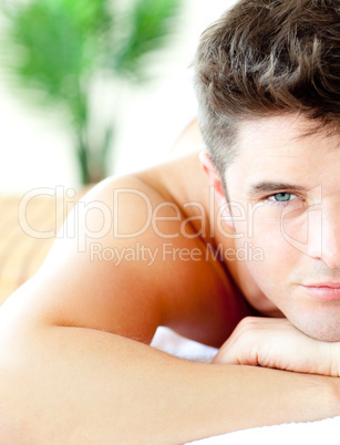 Close-up of an attractive man in a spa center