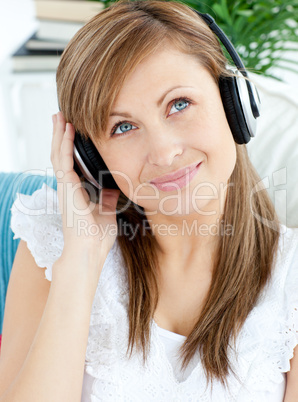 Portrait of a pretty woman listen to music with headphones