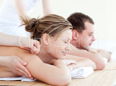 Loving couple having an acupunctre therapy