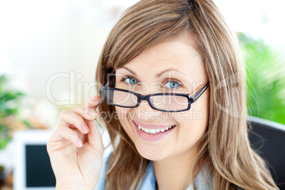 Attractive businesswoman smiling at the camera Attractive businesswoman smiling at the camera