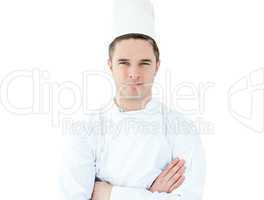 Attractive young chef  with folded arms