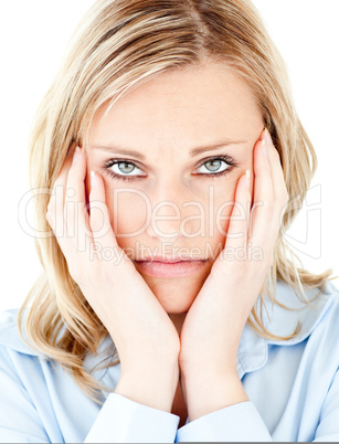 Portrait of an unhappy blond woman looking at the camera