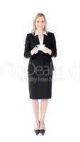 Cheerful businesswoman holding a cup of coffee