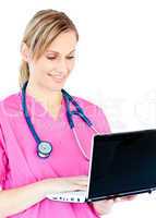 Busy female surgeon using her laptop standing