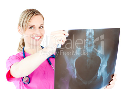 Glowing young surgeon holding a x-ray