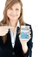 Isolated woman showing at a calculator