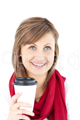 Positive woman holding a coffee wearing a scarf
