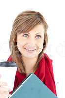 Radiant caucasian woman holding a book and coffee