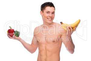 Mann mit Bananen und Paprika