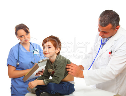 Doctor and Nurse examining a boy