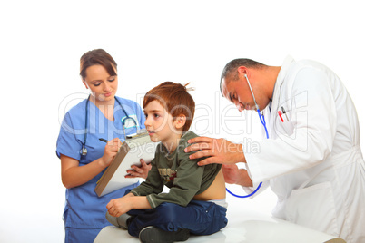 Doctor and Nurse examining a boy