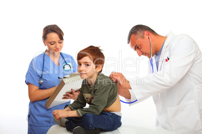 Doctor and Nurse examining a boy