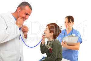 Doctor and Nurse examining a boy having fun