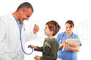 Doctor and Nurse examining a boy having fun