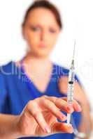 nurse holding a medical syringe