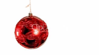 red bauble spinning