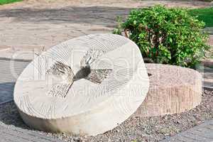 Decorative carved millstones
