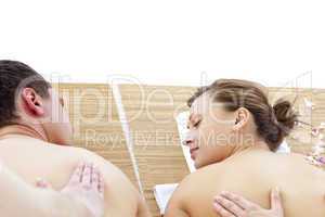 Relaxed couple receiving a back massage