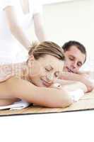 Relaxed caucasian couple enjoying a back massage