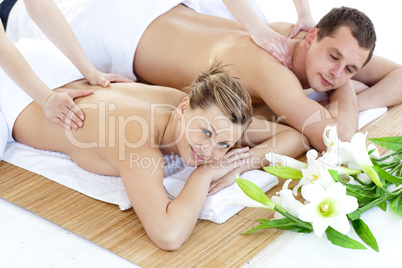 Affectionate young couple having a back massage